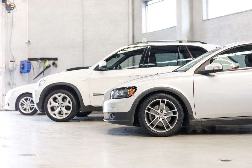 White cars in the shop