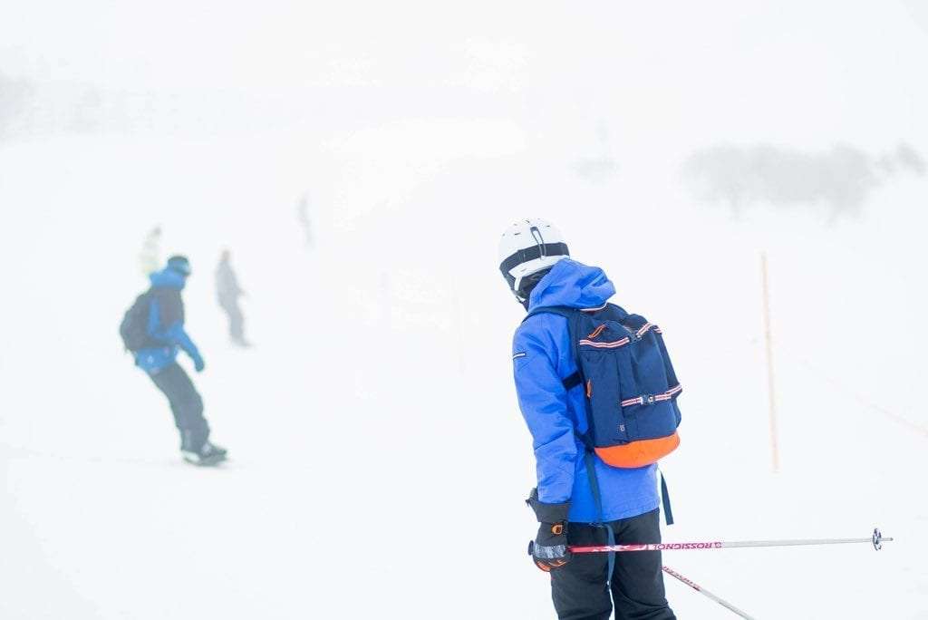 Snowboarding and skiing