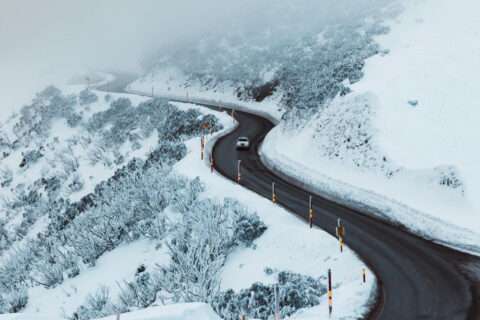 A snowy road that demands some car heating.