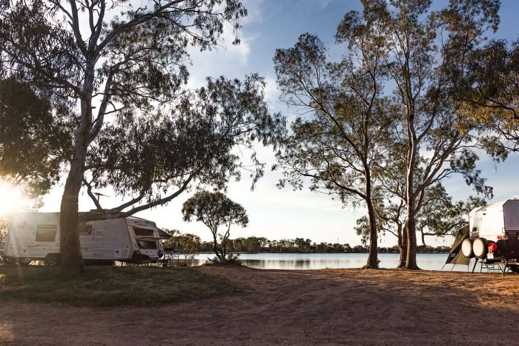 RV parked near a lake