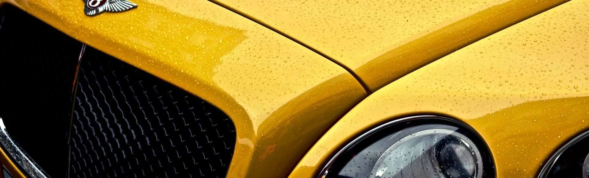 Close up photo of a yellow car