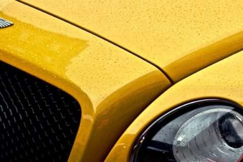 Close up photo of a yellow car