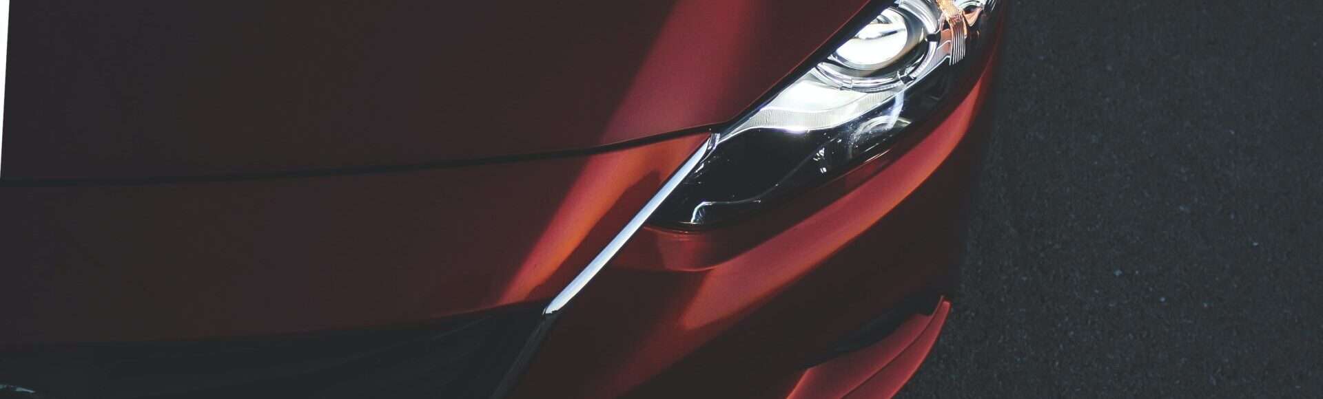 Headlights on a red car