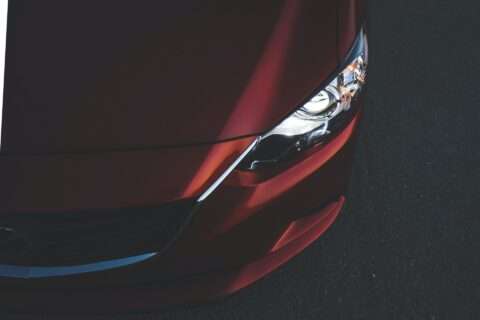 Headlights on a red car