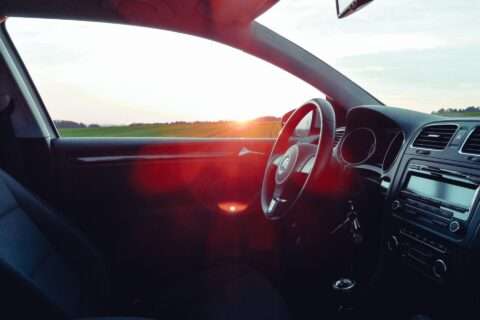 Car at sunset, won't start but making a clicking noise.