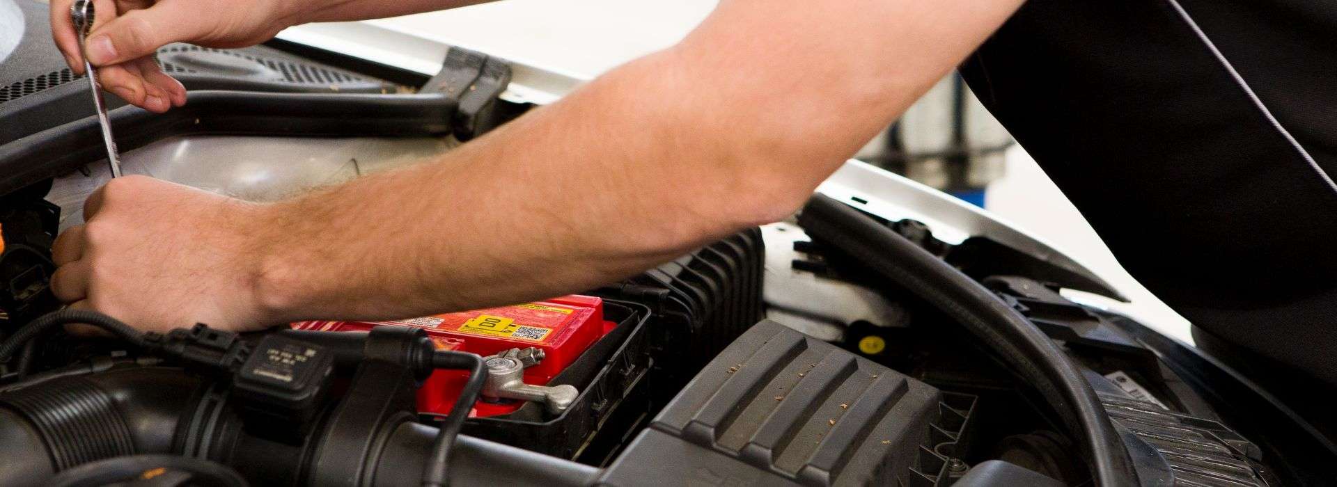 Mechanic fixing a car