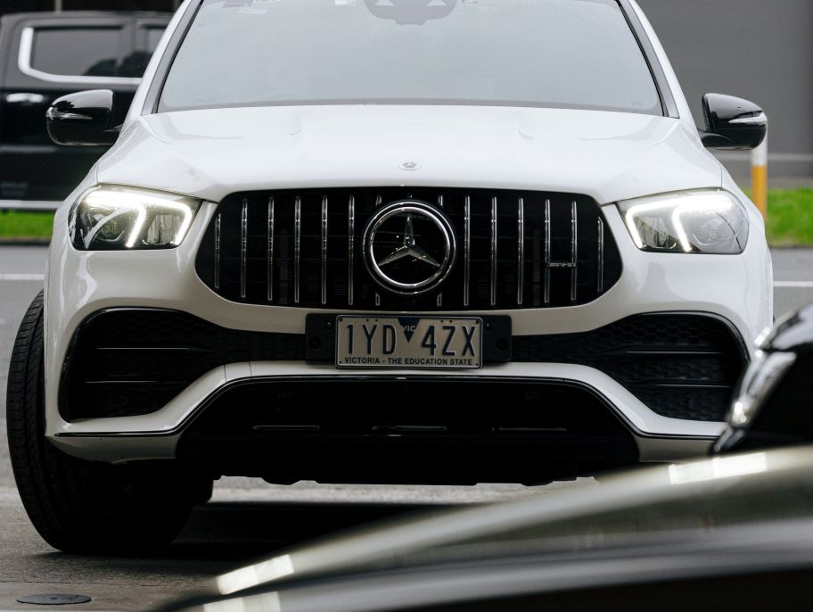 Front of a white Mercedes