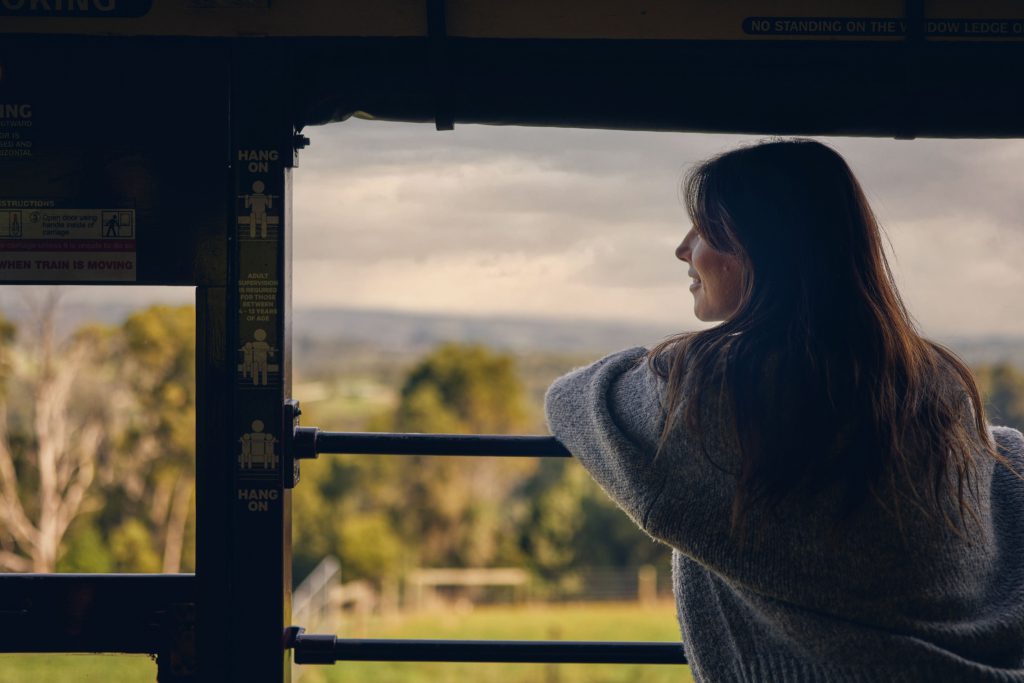 Woman looking at the trees
