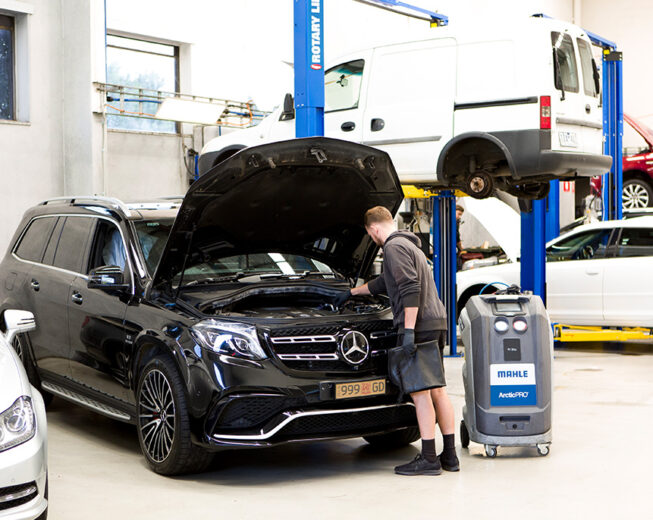 Black Mercedes in the shop