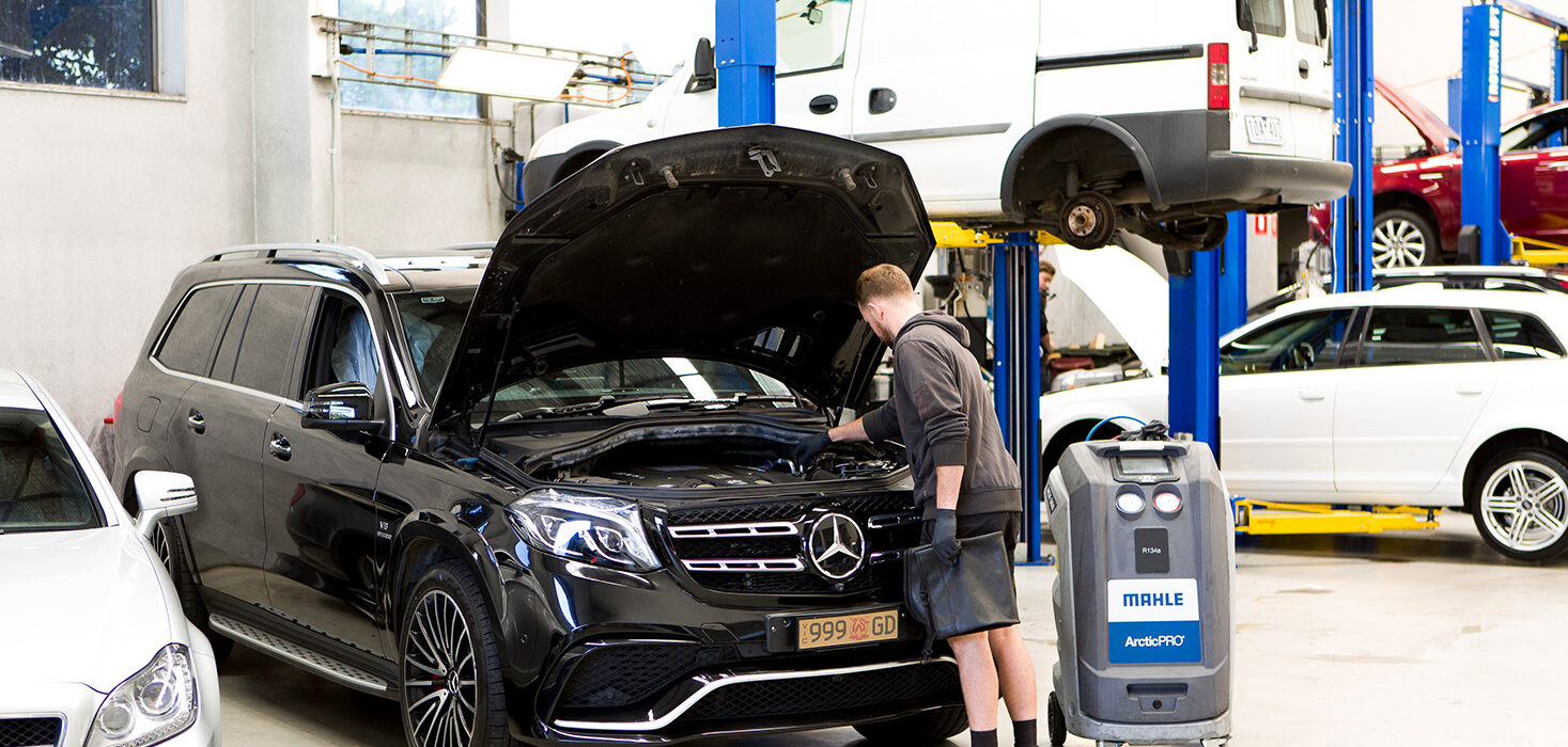 Black Mercedes being repaired