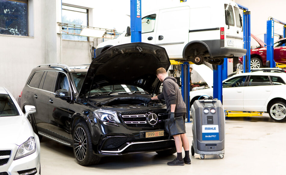 Black Mercedes being repaired