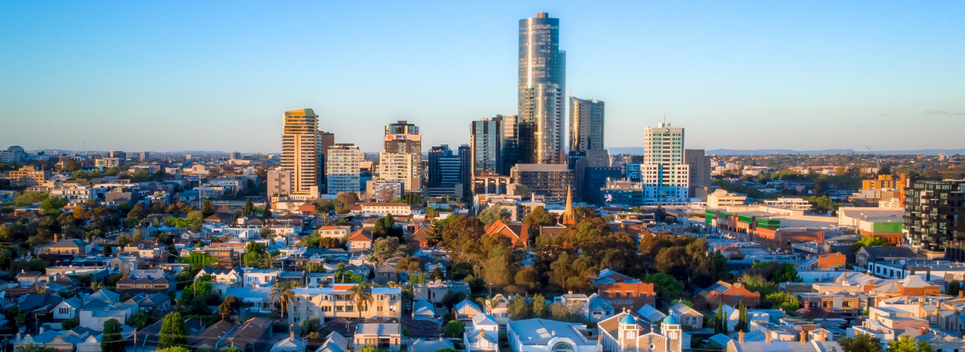 Vibrant Sydney city skyline with modern skyscrapers and sunny weather in en_AU.